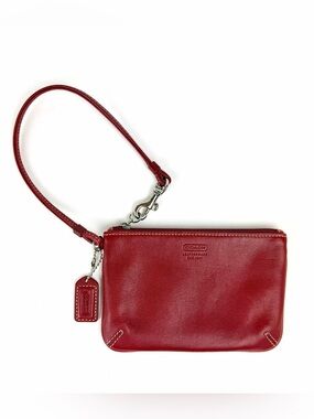 Coach wristlet with wrist strap and ID tag
